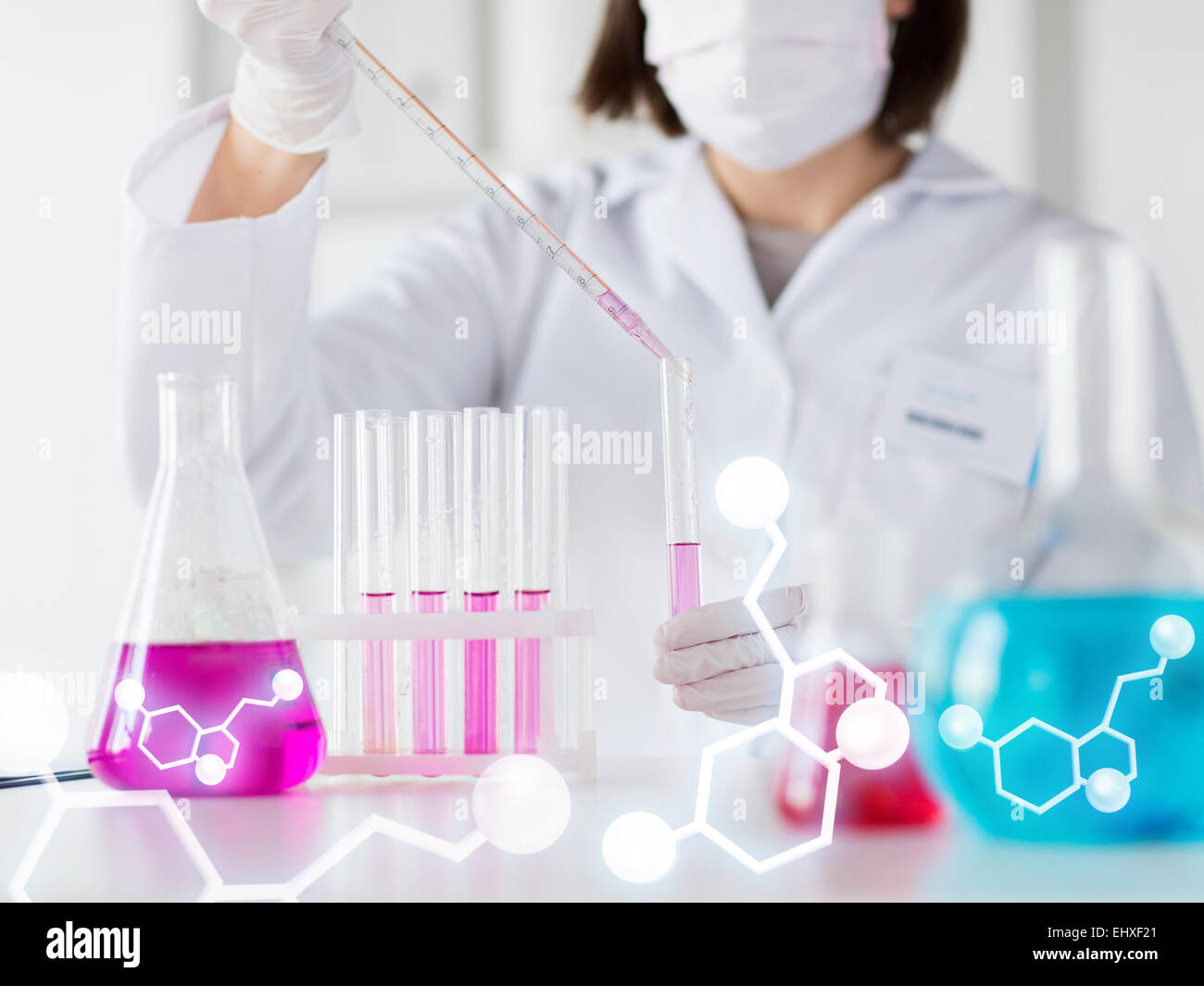 Lab Making Science lab beaker filling hi-res stock photography and images - Alamy