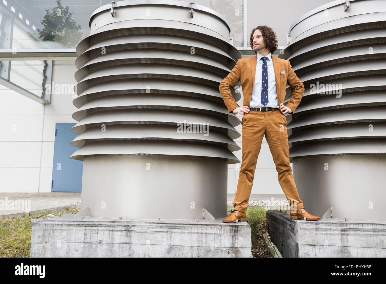 Arrogant young businessman ventilation shaft Stock Photo