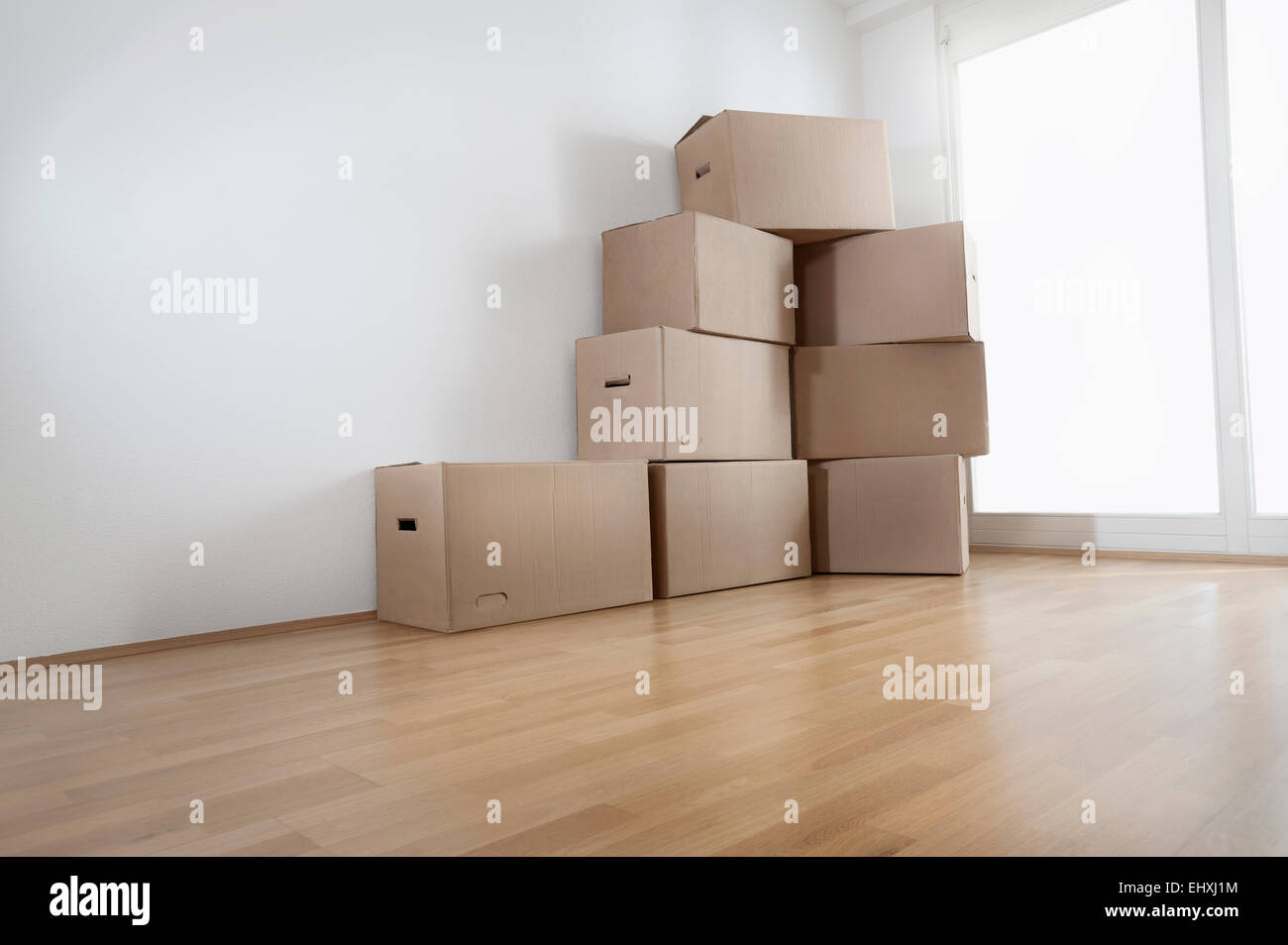 Stack of cardboard boxes in a room, Bavaria, Germany Stock Photo Alamy