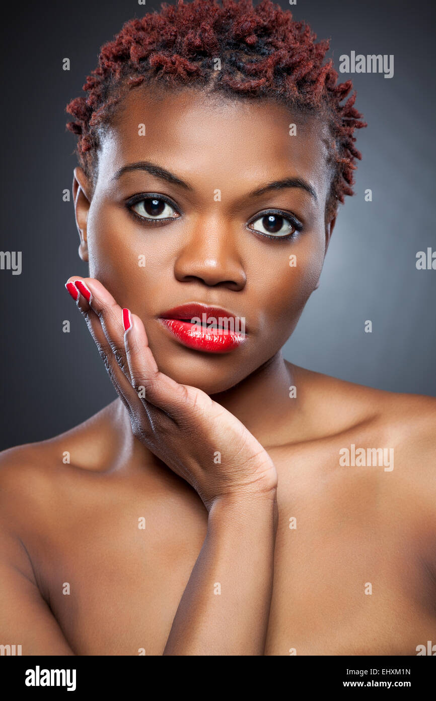 Black beauty with short spiky red hair Stock Photo - Alamy Black beauty with short spiky red hair Stock Photo - Alamy