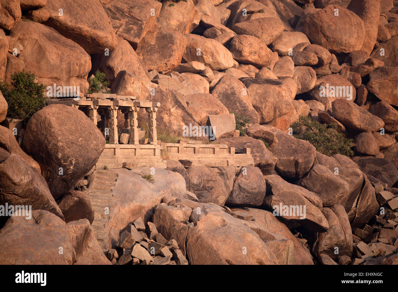 India, Karnataka, landscape with temple and granite rocks in Hampi