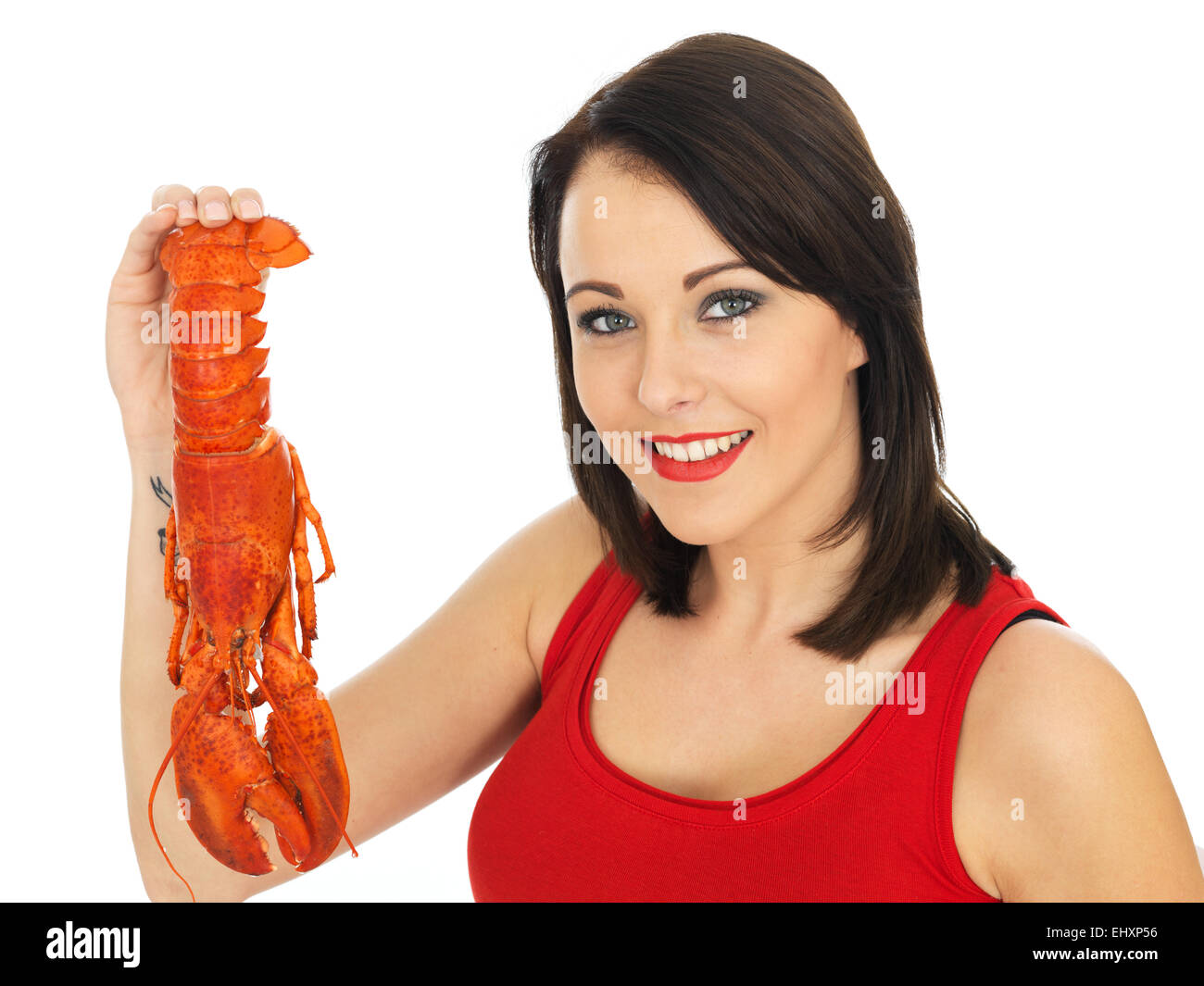 Attractive Young Woman Holding a Cooked Lobster Stock Photo Alamy