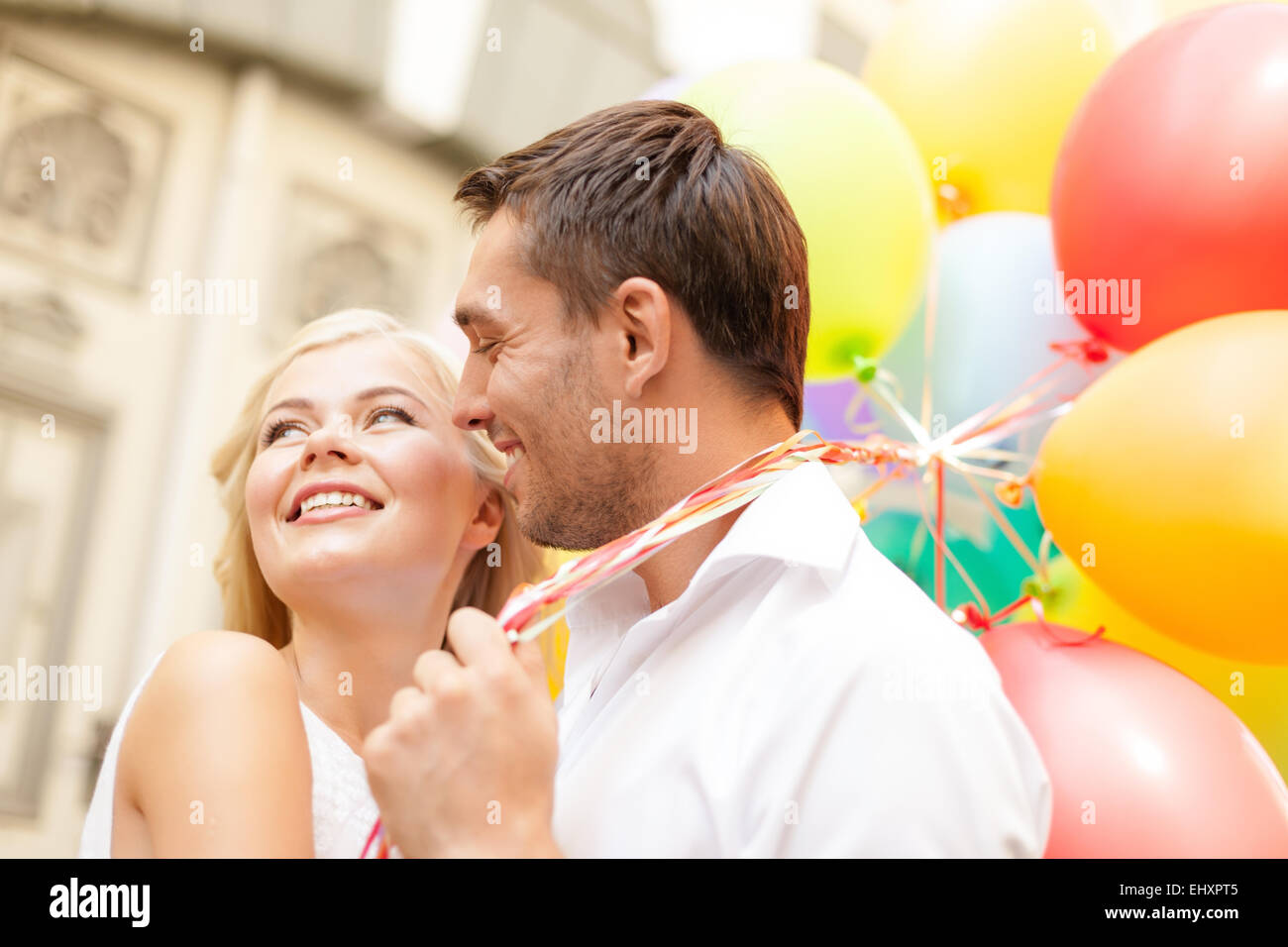 happy couple with colorful balloons Stock Photo