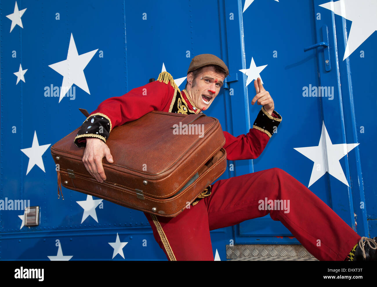 Circus Clown at Southport, Merseyside, UK 18th March, 2015. Professional clown 'Crazy Blakey' aka Blake Richardson prepares for his 1st performance.   The all-human circus spectacular, owned by Show Directors John Courtney and Stephen Courtney trading as Circus Vegas/American Circus has arrived in SOUTHPORT, the travelling show produced by the famous Uncle Sam's Great American Circus, tours for ten months a year. Stock Photo