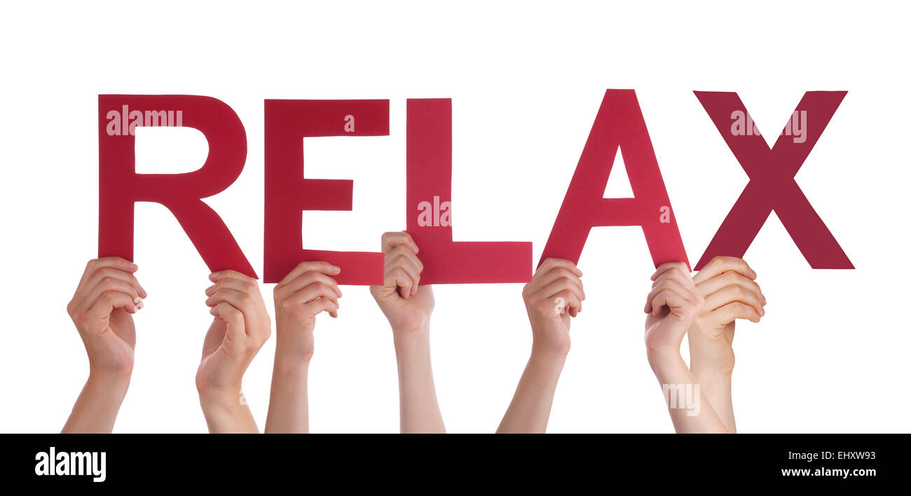 Many Caucasian People And Hands Holding Red Straight Letters Or Characters Building The Isolated English Word Relax On White Bac Stock Photo