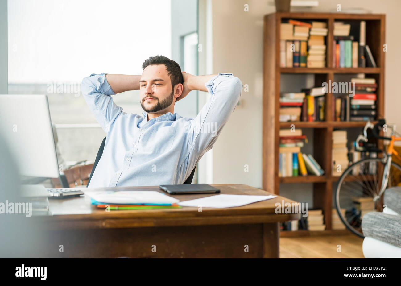 Man behind student desk hi-res stock photography and images - Alamy
