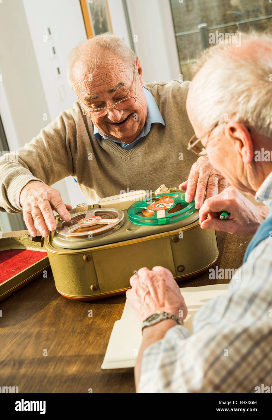 Two senior friends with old-fashioned recorder Stock Photo