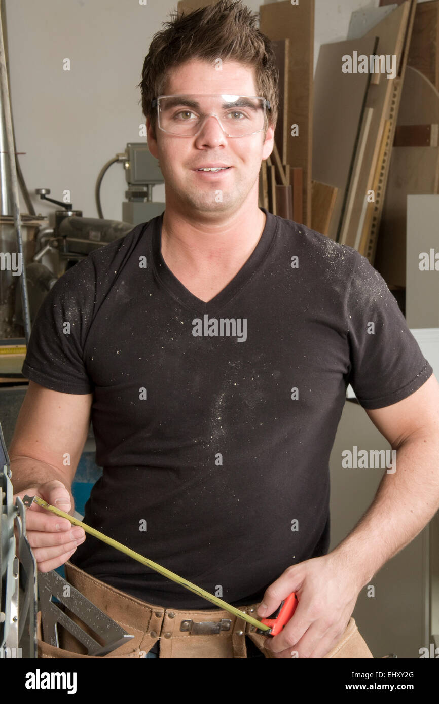 Carpenter at work on job using power tool Stock Photo Alamy