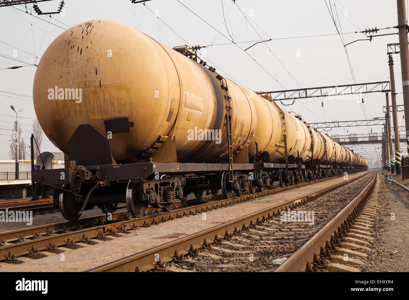 Cargo train with oil tanker cars on the freight station Stock Photo