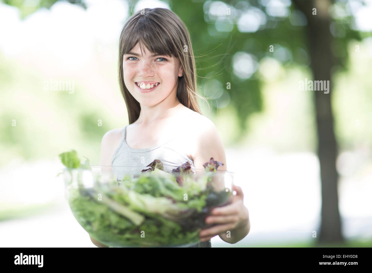 Girl 10 11 years holding leaf hi-res stock photography and images - Alamy