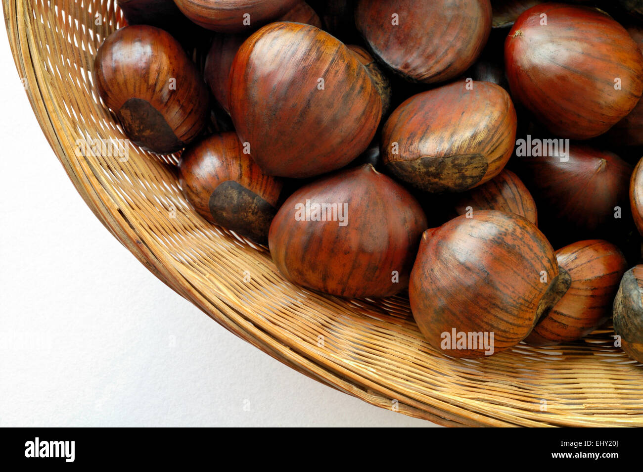 Chestnuts in basket Stock Photo