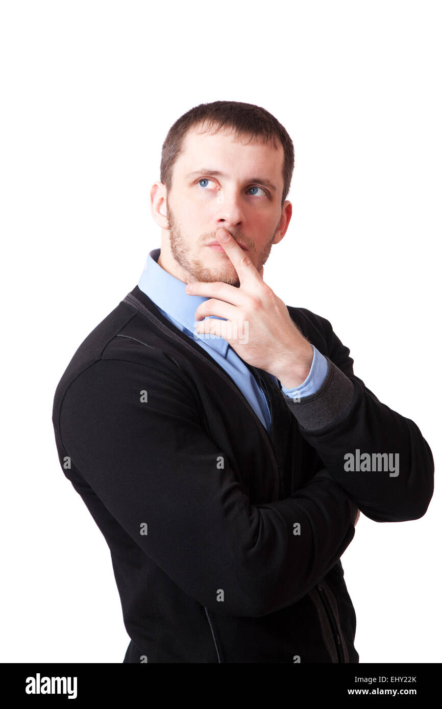 Attractive man thoughtfully rubbing his chin, isolated on white background Stock Photo