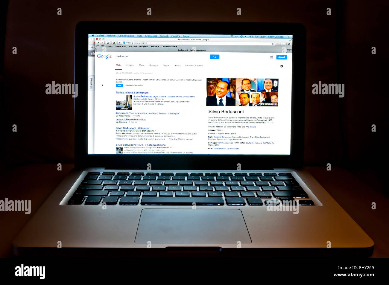 photo detail of laptop showing Google web search related to Silvio Berlusconi in Milan, Italy. Stock Photo