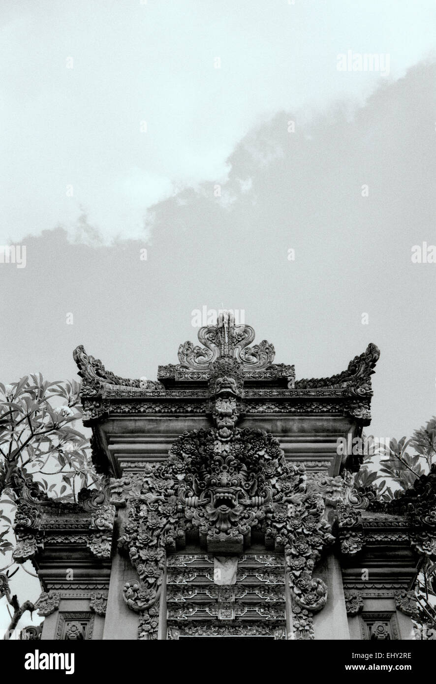 Ornate decorative entrance to a Hindu temple in Ubud in Bali in Indonesia in Southeast Asia. Religion Religious Architecture Building Beauty Travel Stock Photo
