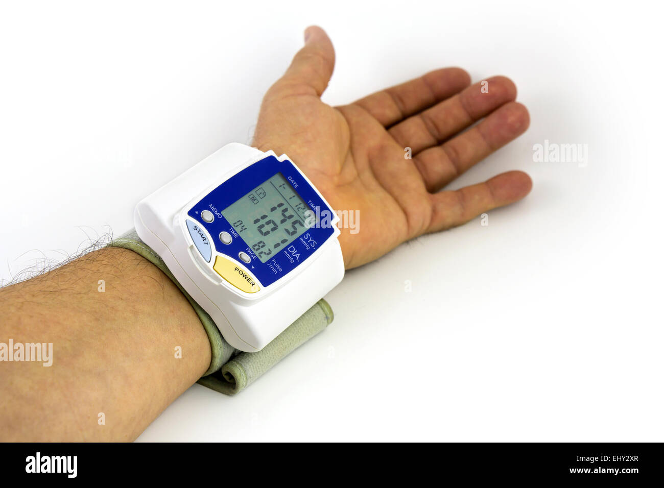 Man himself measured his own blood pressure on a wrist Stock Photo