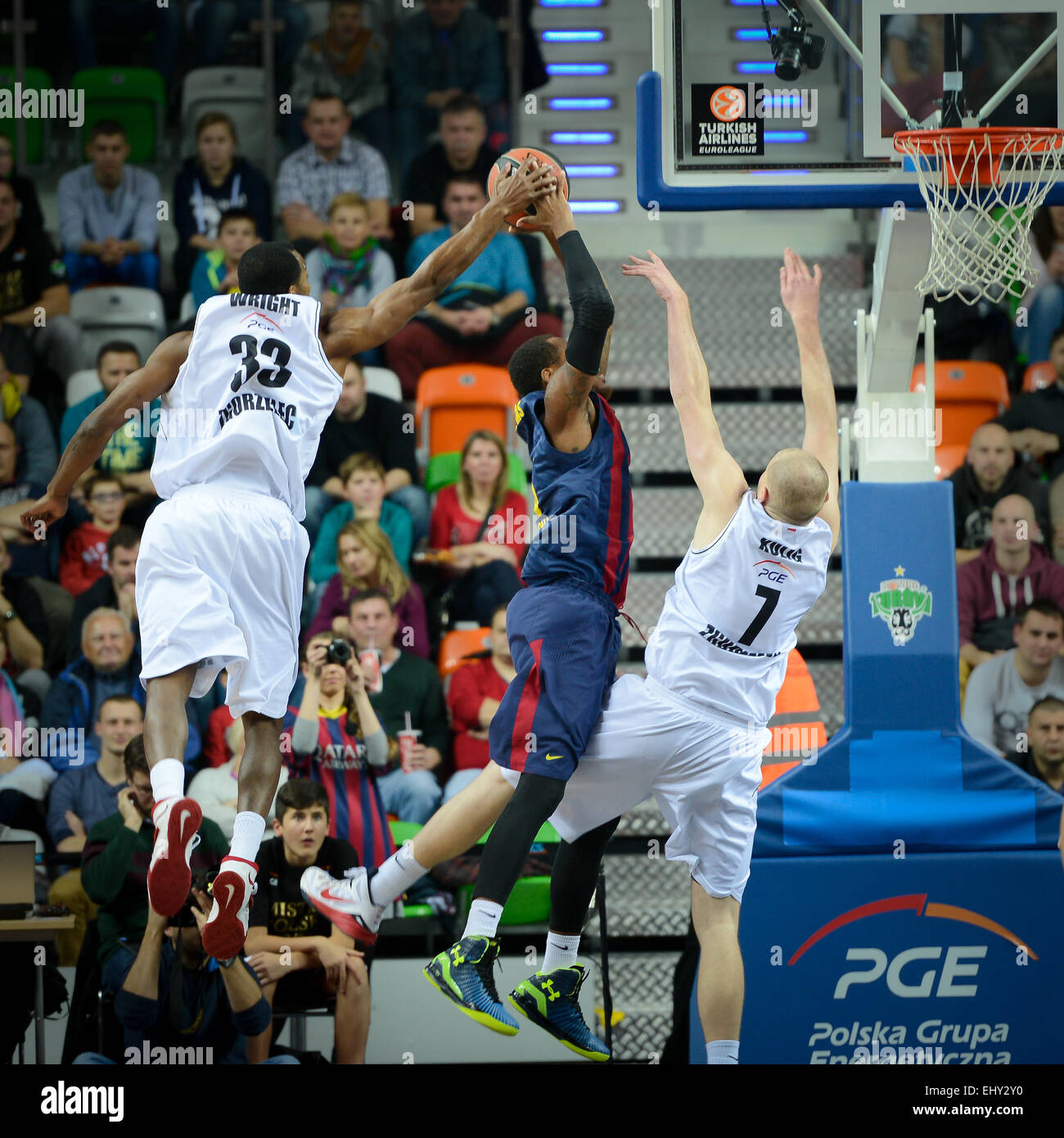 Chris Wright (L), Deshaun Thomas and Damian Kulig (R) in action during the Euroleague basketball match Stock Photo