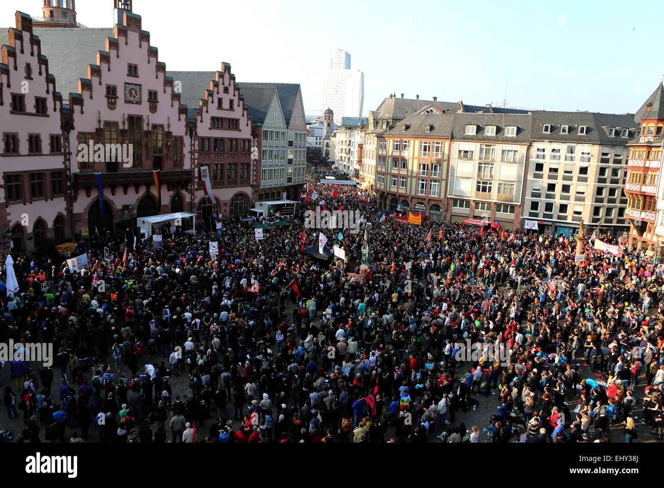 Frankfurt, Germany. 18th Mar, 2015. Supporters of Blockupy Alliance demonstrate after the European Central Bank (ECB) officially inaugurated its new headquarters in Frankfurt, Germany, on March 18, 2015. At least 88 policemen were injured and more than 500 people were arrested after anti-austerity protests in Frankfurt turned into clashes between protesters and police on Wednesday, local media reported. Credit:  Luo Huanhuan/Xinhua/Alamy Live News Stock Photo