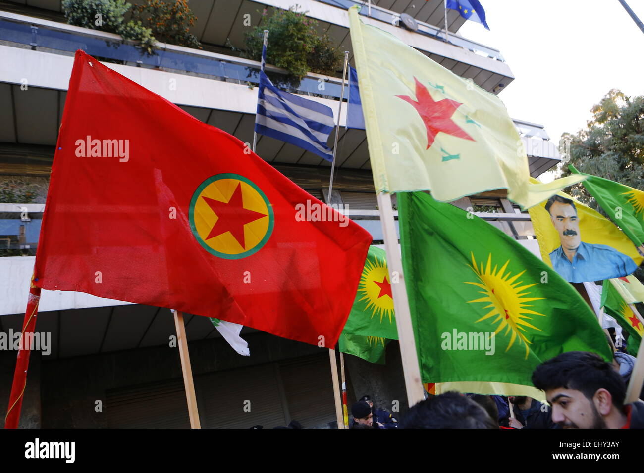 Athens, Greece. 18th March 2015. Vrious Kurdish flags flit outside the EU offices in Athens. Kurdish people in Athens marched to the EU offices in Athens, protesting in support of the Kurdish people in Syria, and called for the Turkish president Erdoğan to support them against the Islamic State. Credit:  Michael Debets/Alamy Live News Stock Photo