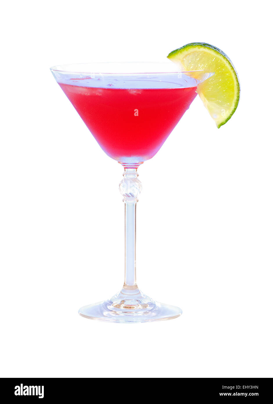 red cocktail with lime on white background. martini glass Stock Photo