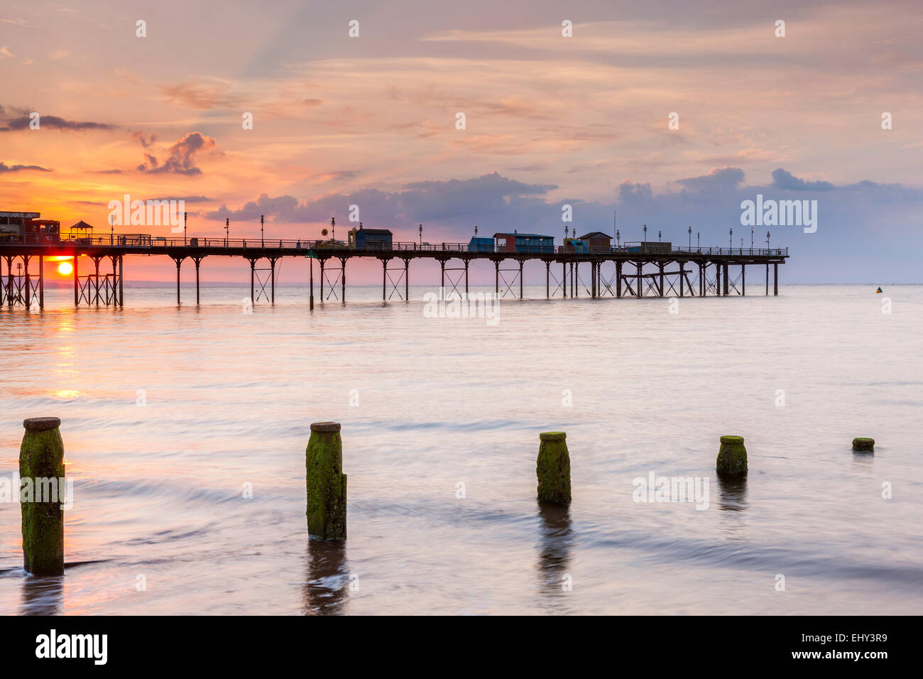 Sunrise over the historic pier at Teignmouth, Devon, England, United