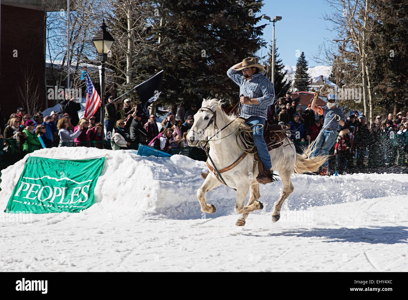 Skijoring competition down main street Leadville Colorado during winter festival Stock Photo