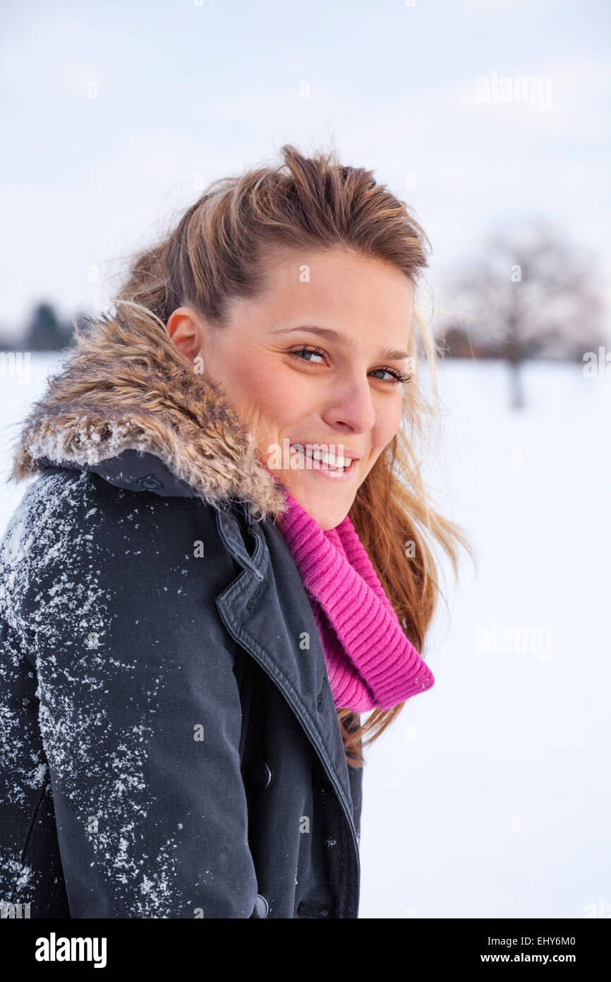 Young woman in snowy landscape, portrait Stock Photo - Alamy