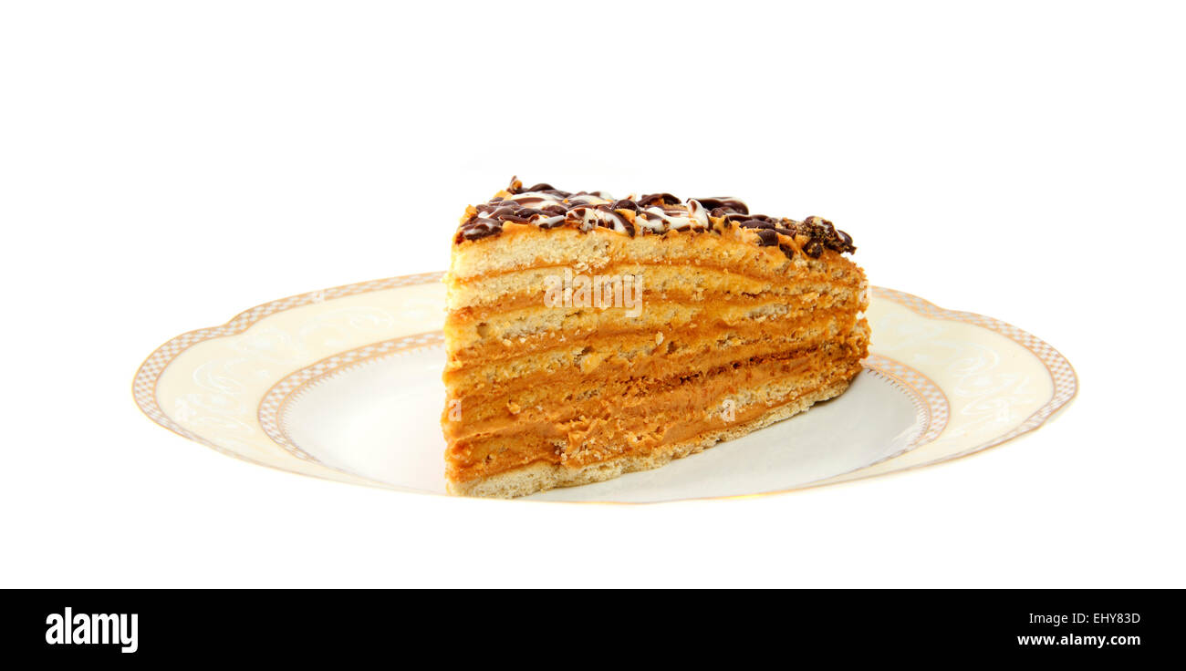 Sweet Slice of honey cake. Isolated Stock Photo Alamy