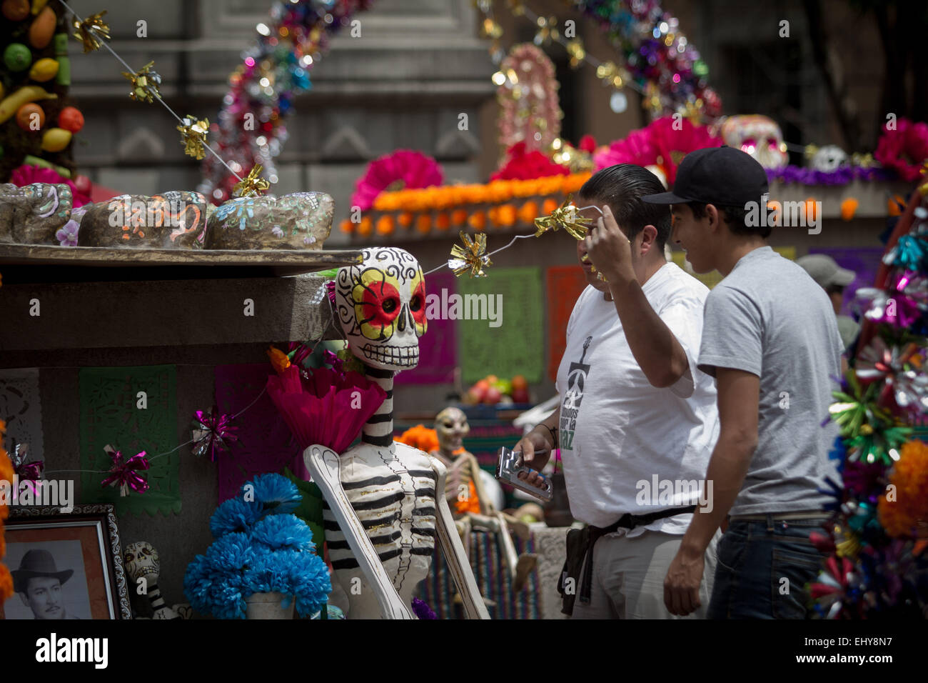 Mexico City, Mexico. 18th Mar, 2015. Employees arrange props for the filming of the new James Bond movie Spectre in the downtown of Mexico City, capital of Mexico, on March 18, 2015. Credit:  Alejandro Ayala/Xinhua/Alamy Live News Stock Photo