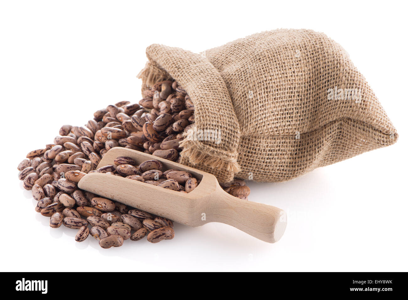 Pinto beans bag with wooden scoop on white background Stock Photo Alamy
