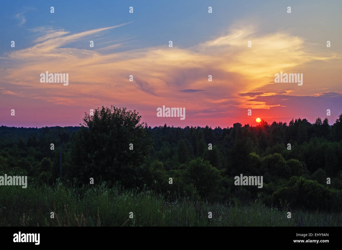 Sunset rural landscape Stock Photo - Alamy