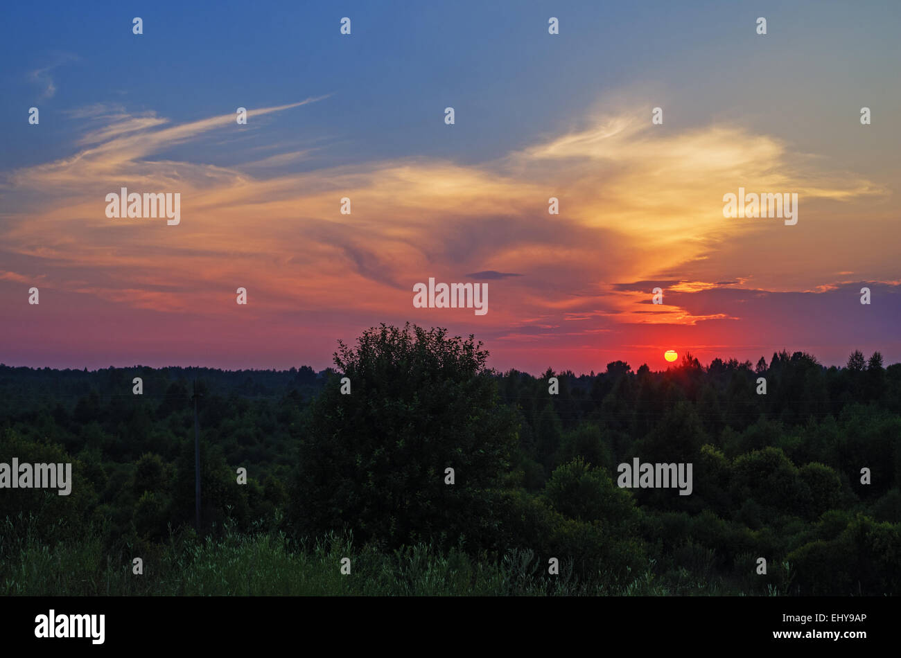Sunset rural landscape Stock Photo - Alamy