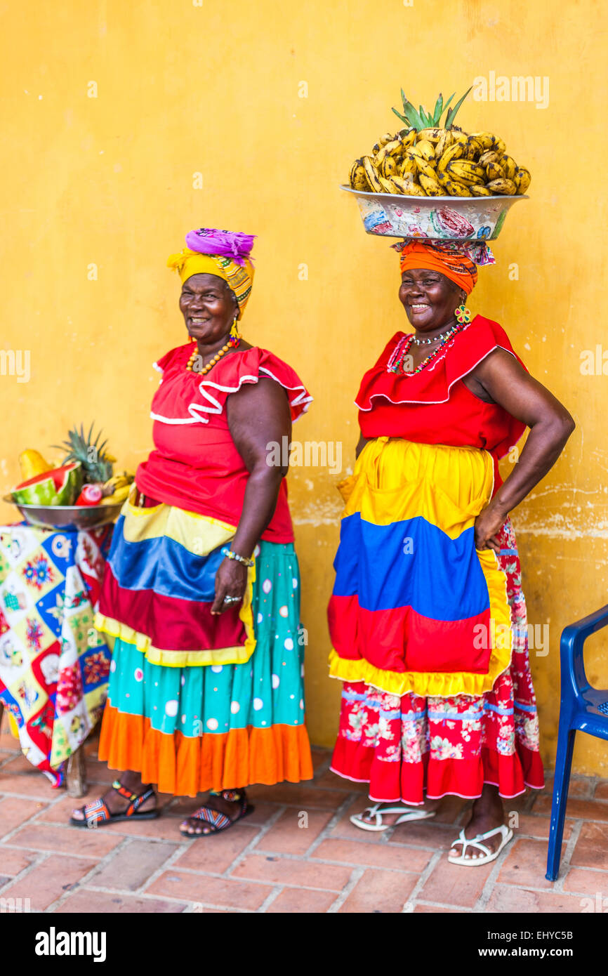 Traditional fruit sellers from Palenque (Palenqueras), Cartagena de Indias, Colombia. Stock Photo