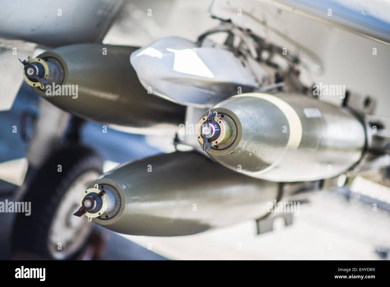 3 AirLaunched Missiles Under Military Airplane Wing. Aircraft Weapon