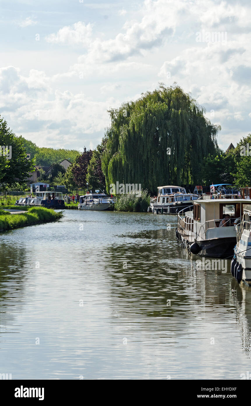 On an August afternoon the marina at Fragnes is crowded with pleasure boats, Canal du Centre, Burgundy, France. Stock Photo