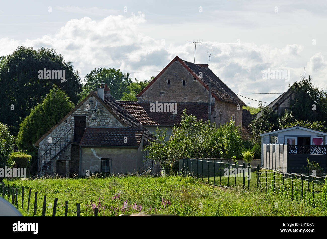 Traditional stone houses in the village of Fragnes on the Canal du Centre, Burgundy, France. Stock Photo