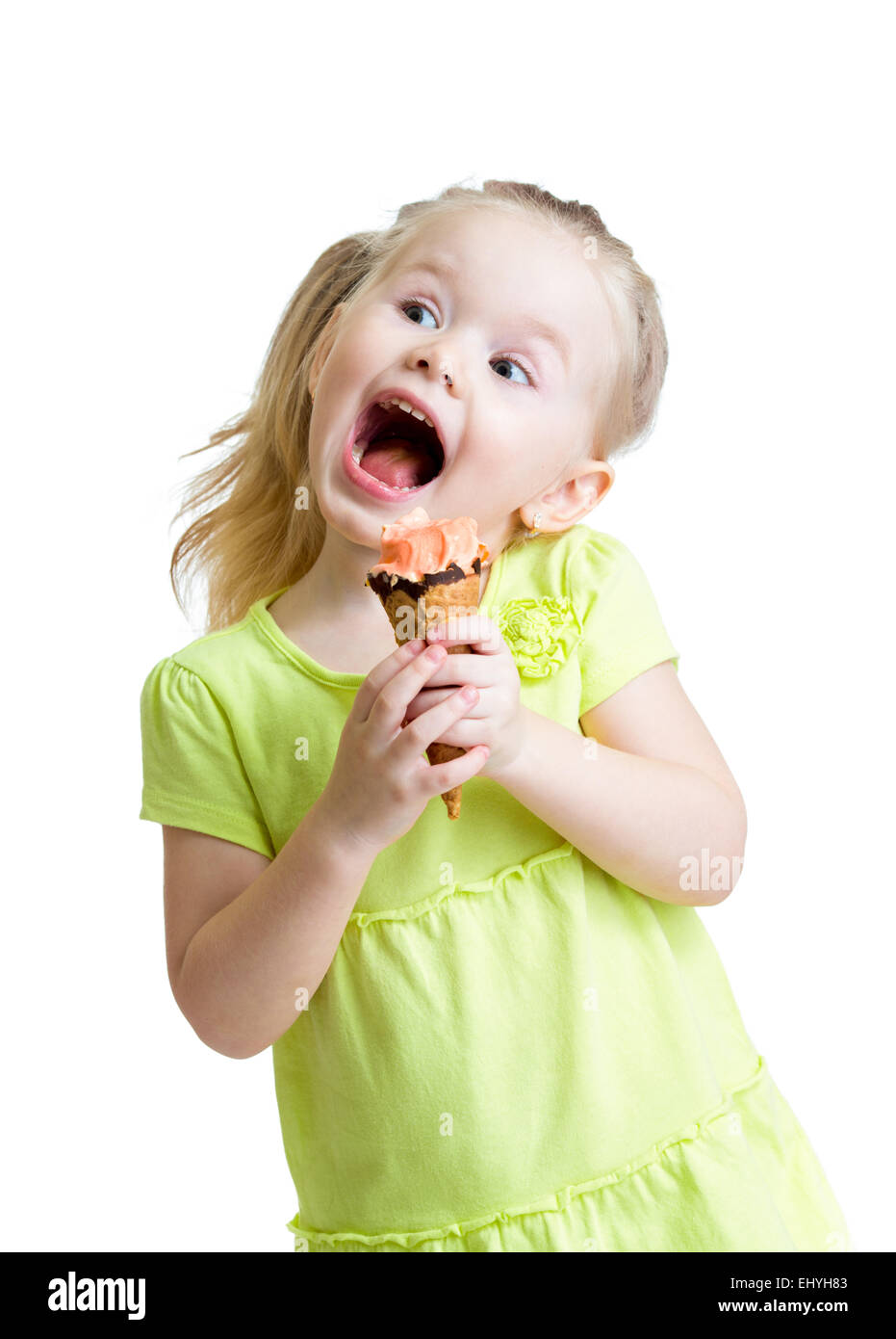 happy kid girl eating ice cream isolated Stock Photo