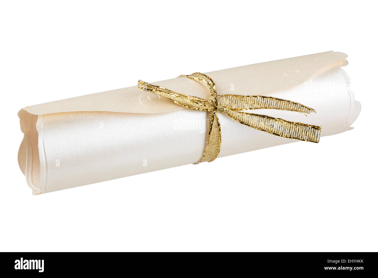Rolled parchment with golden ribbon isolated over white background with clipping path Stock Photo