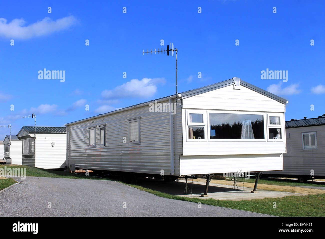 Exterior of a modern caravan on a trailer park in summer, England. Stock Photo