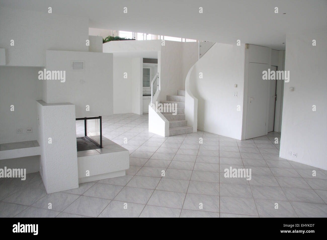 Switzerland, house, home, one family house, luxurious, inside, blank, room, chimney, fireplace, paving tiles, white, sitting room Stock Photo