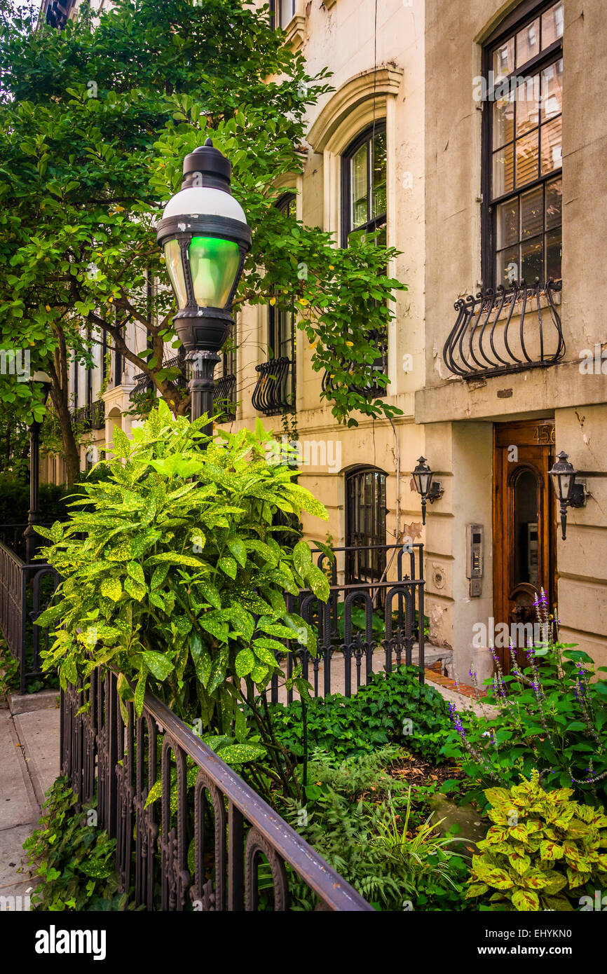 Gardens and townhouses along 23rd Street in Chelsea, Manhattan, New