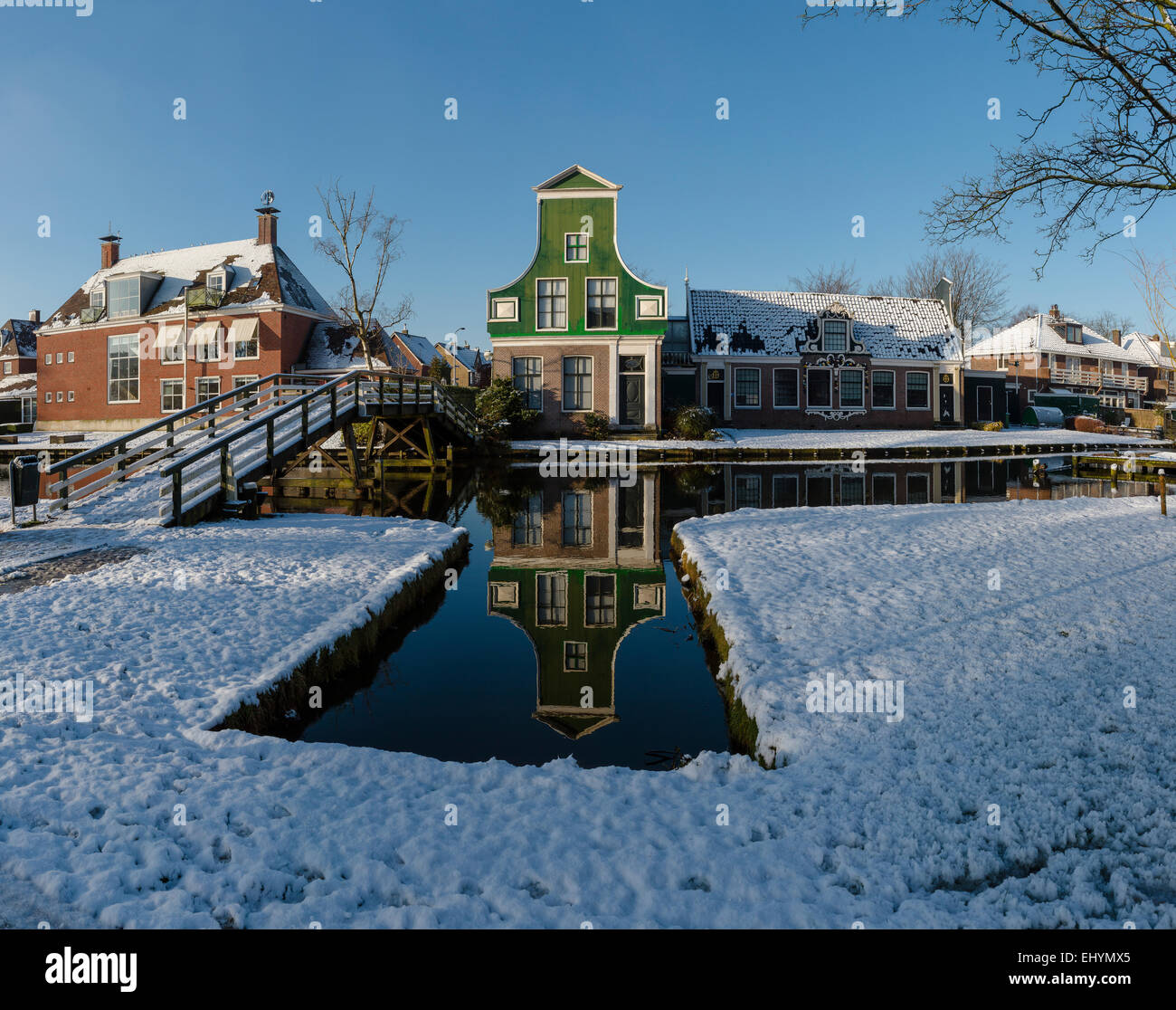 Netherlands, Holland, Europe, Koog aan de Zaan, Windmill museum, house, water, winter, snow, ice, reflections, Stock Photo
