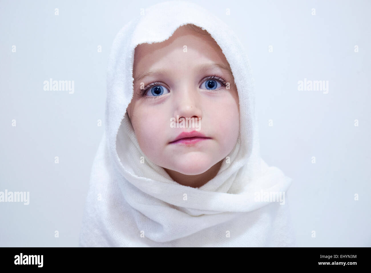 Portrait of a girl wearing a white headscarf Stock Photo Alamy