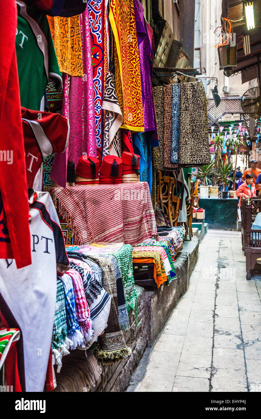 Colourful dress fabrics in the Khan el-Khalili souk in Cairo. Stock Photo