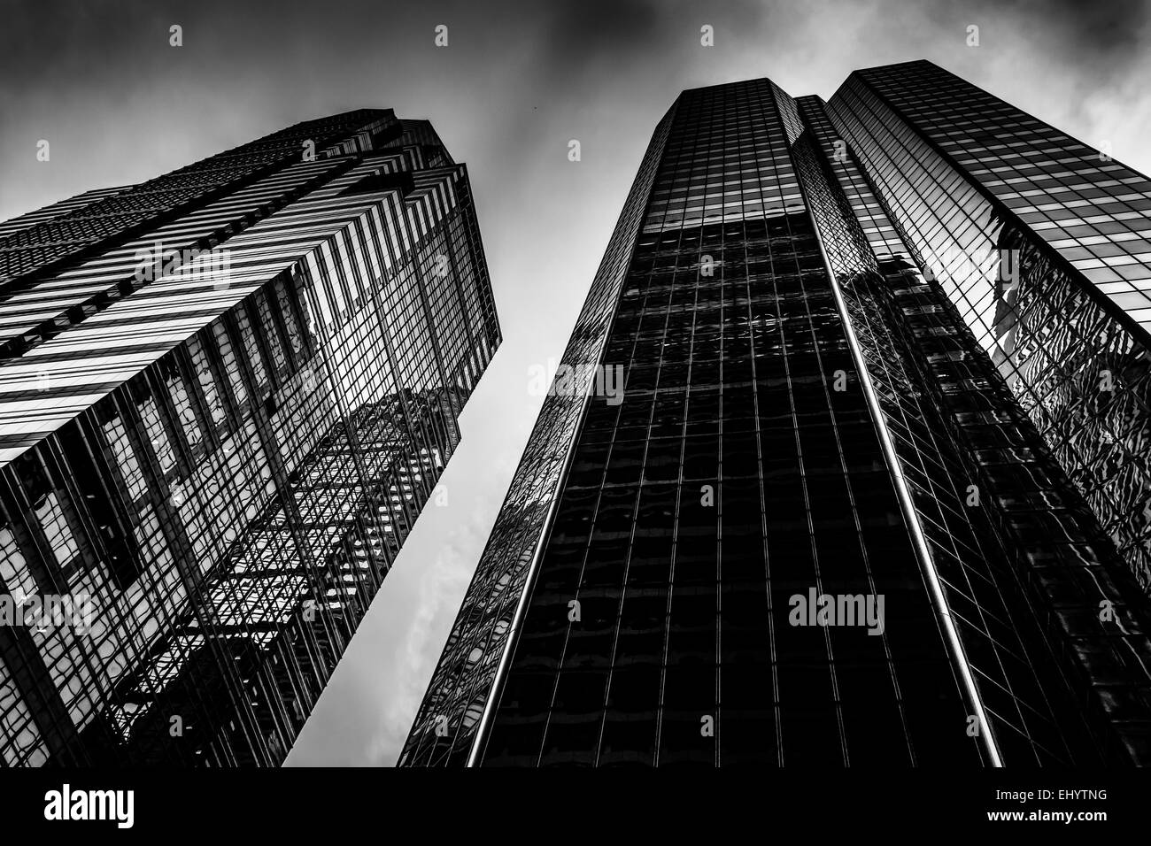 Looking up at modern buildings under a cloudy sky in Philadelphia ...