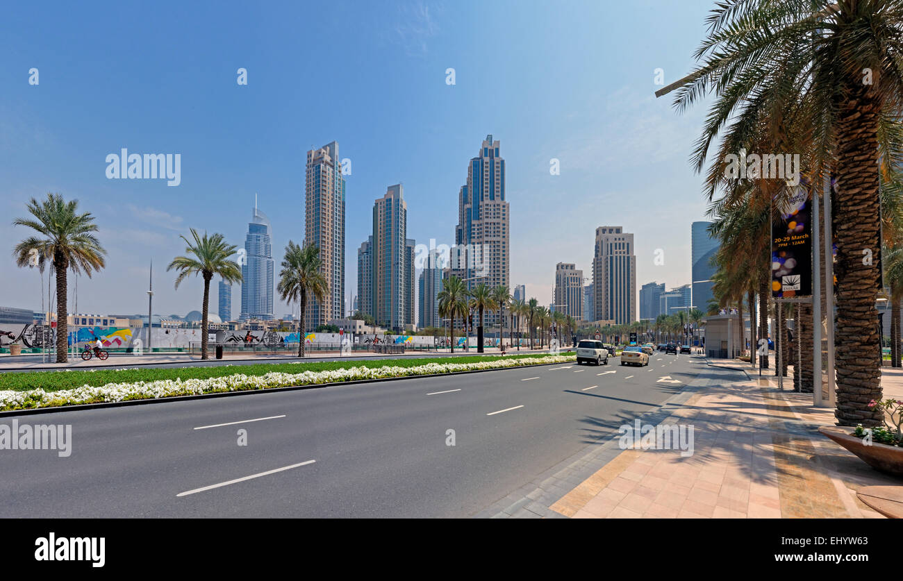 Asia, United Arab Emirates, UAE, Dubai, Sheikh Mohammed Bin Rashid boulevard, street scene, palms, architecture, trees, buildings Stock Photo