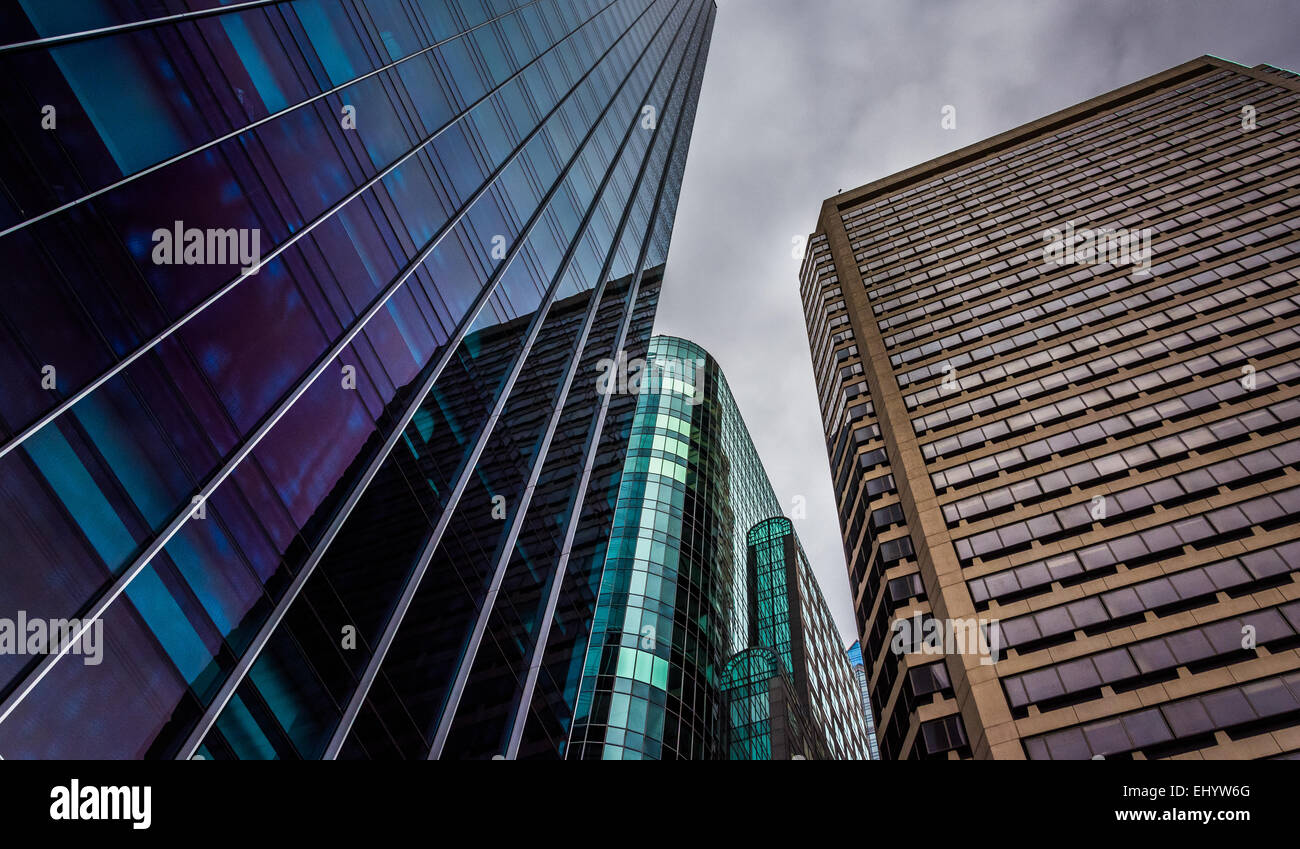 Looking up at modern buildings under a cloudy sky in Philadelphia ...