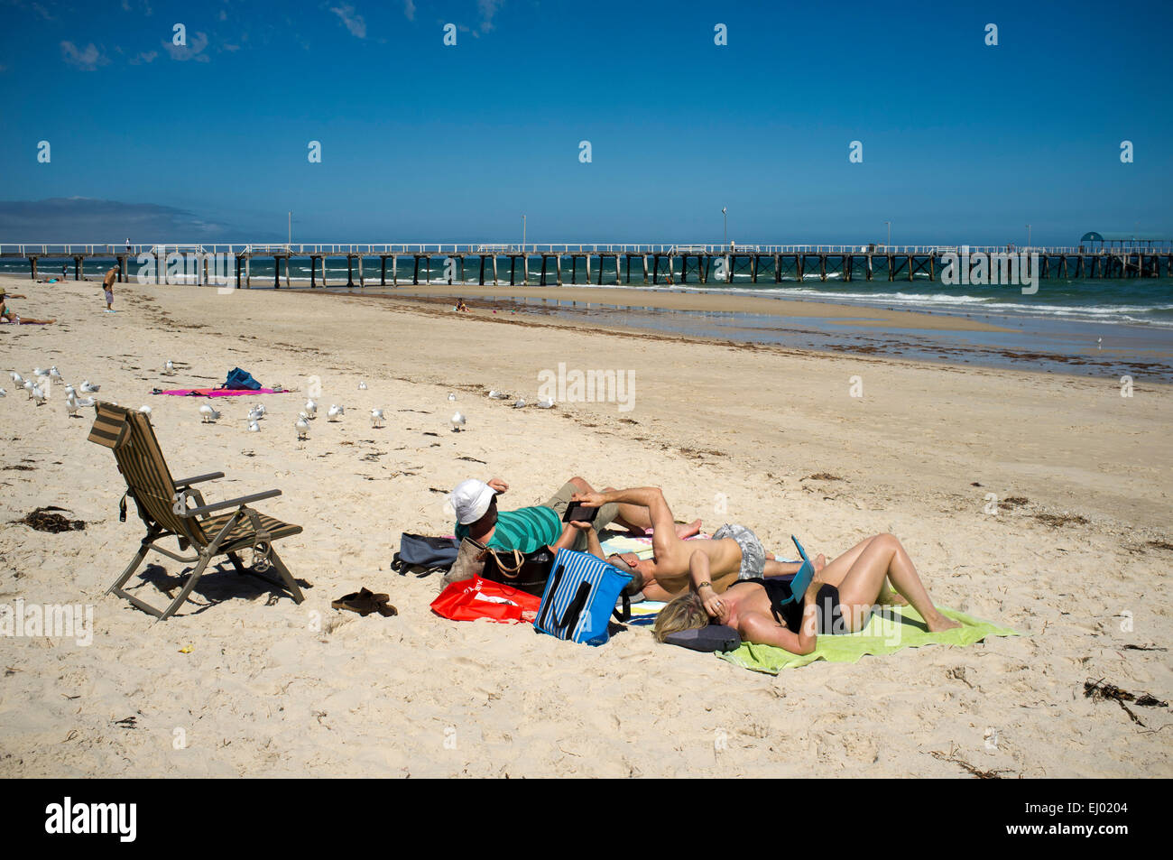 Adelaide Austalia. 19th March 2015. People took advantage of the warm weather by going to the beach on an autumn day as temperatures remained above average. Credit:  amer ghazzal/Alamy Live News Stock Photo