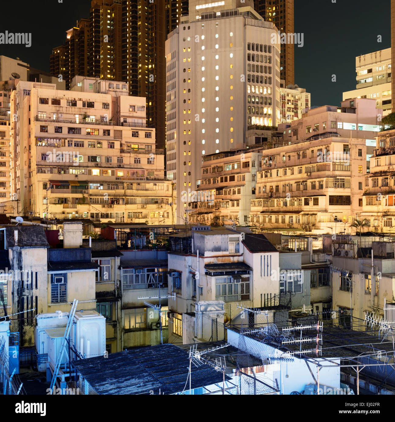 Apartment buildings at night in Hong Kong Stock Photo - Alamy