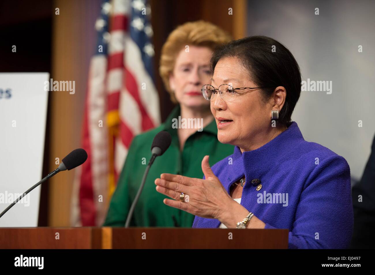 Democratic Senator Mazie Hirono speaks during a press conference on the delayed confirmation of Attorney General nominee Loretta Lynch by Senate Republicans as senator Debbie Stabenow looks on March 18, 2015 in Washington, DC. Stock Photo