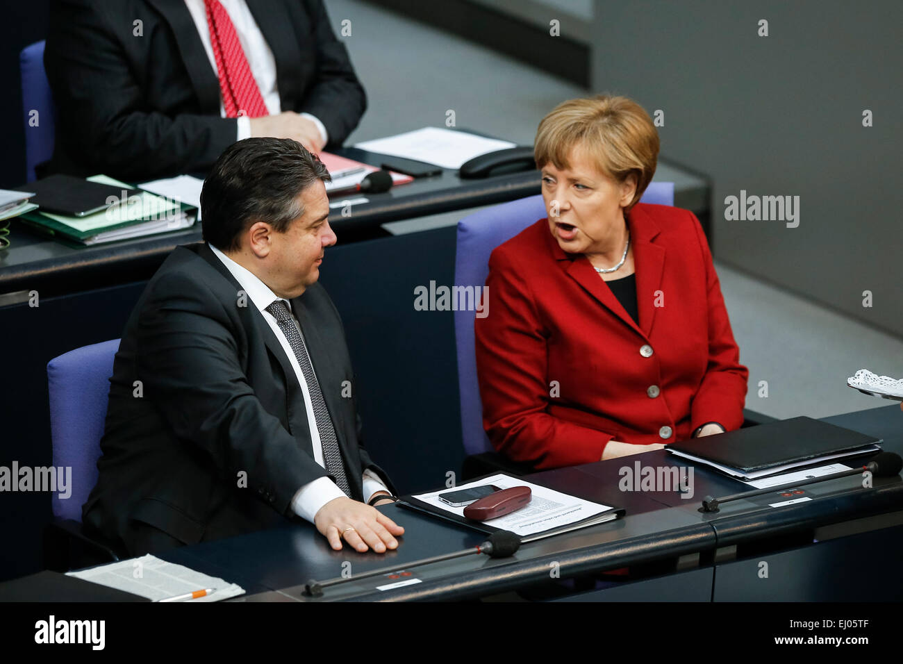 Berlin, Germany. 19th Mar, 2015. Delivery of a governmental declaration by the German Chancellor Angela Merkel in the Bundestag on March 19, 2015 in Berlin, Germany. / Picture: (l) Frank-Walter Steinmeier (SPD), German Foreign Minister, and (c) Sigmar Gabriel (SPD), German Minister of Economy and Energy, and (r) Chancellor Angela Merkel (CDU). Credit:  Reynaldo Chaib Paganelli/Alamy Live News Stock Photo